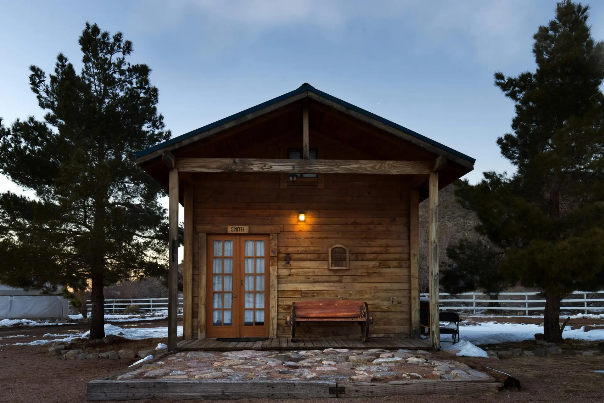 A charming wooden cabin surrounded by nature, perfect for a cozy retreat.